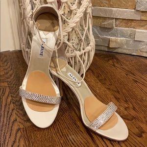 Eye catching sexy yet elegant dress high heel shoe. Like new condition